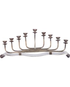 Wiener Werkstätte style influence. Graduated row of eight elongated candleholders set on curvilinear base. Marked. 5.5 x 13.5 inches (14 x 34.3 cm).