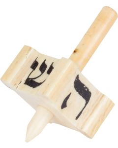 Of classic form, with the four traditional Hebrew letters painted on each side. Length: 2 inches (5.1 cm).