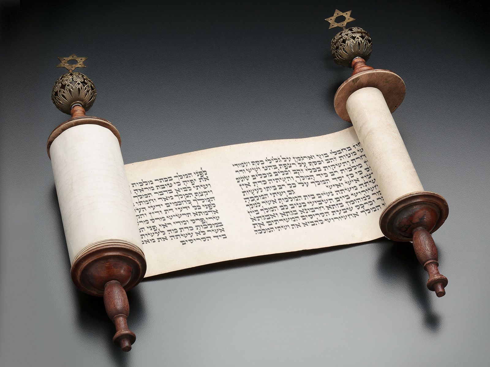 Complete manuscript Esther Scroll on vellum, set on two wooden rollers