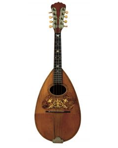 Possibly Lyon & Healy, c. 1910, unlabeled, the 28-stave rosewood back, the ebony fingerboard, the spruce top.