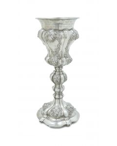 Of elaborate rococo design, rim engraved with lengthy Hebrew inscription from the “Bachurei Eidah” to:  Shabbos Parshath Emor, 1863. Height: 10 inches (26 cm).