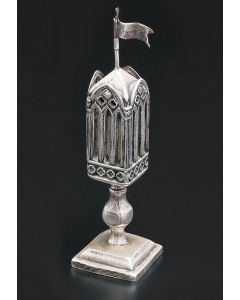 Gothic inspired square-form spice tower, with pointed arch and pierced quatrefoil-headed arcade along each of four sides, topped with pennant. All supported on knob stem and squared, stepped base. Marked: Vasily Peretrutov. Height: 6.5 inches.